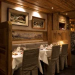 Traditional wood-paneled dining room at La Saulire Courchevel