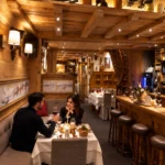 Cozy wood-paneled dining room at La Saulire Courchevel