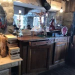 Rustic wooden bar and restaurant interior at La Soucoupe Courchevel
