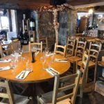 Wooden dining area with rustic alpine decor at La Soucoupe Courchevel