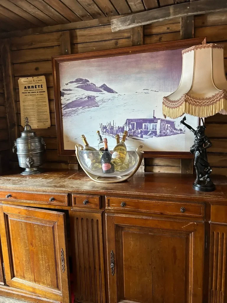 Rustic wood-paneled dining room at La Soucoupe Courchevel