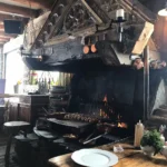 Open kitchen and fire grill inside La Soucoupe Courchevel