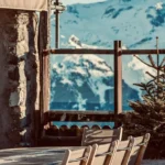 Outdoor terrace with mountain views at La Soucoupe Courchevel