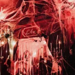 Dramatic red-lit interior at L'Arc Paris nightclub