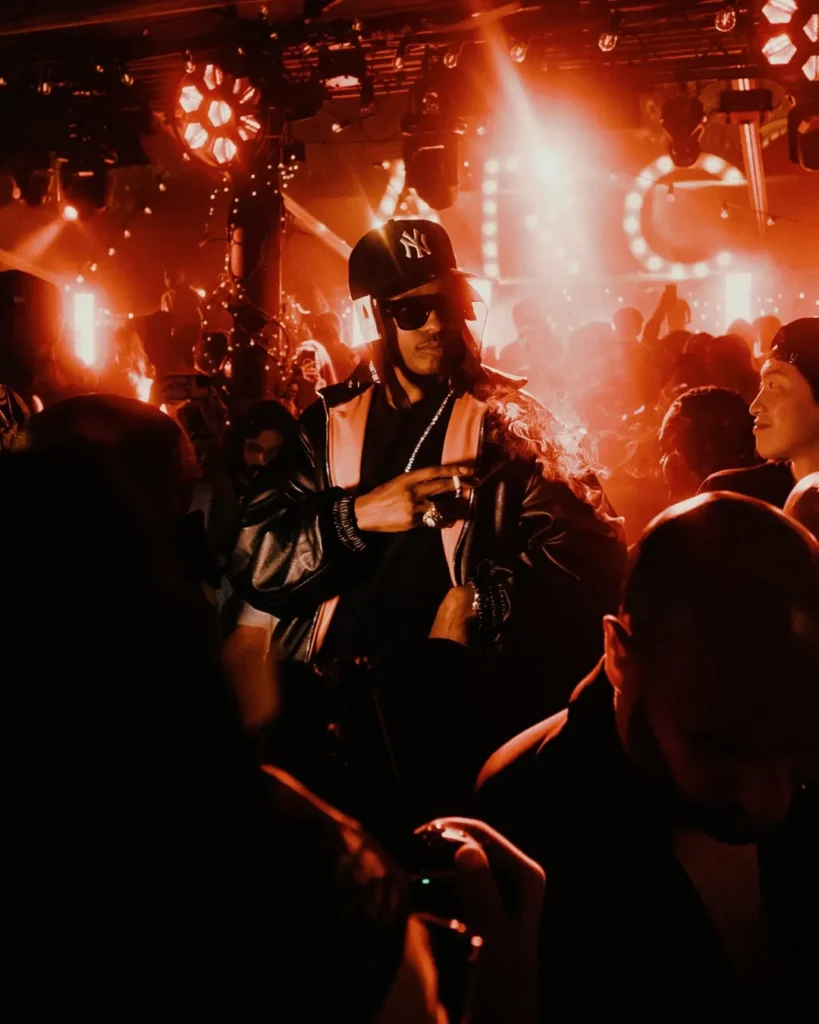 DJ performing during a night at L'Arc Paris