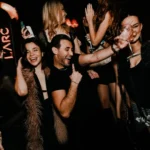 Guests celebrating together at L'Arc Paris