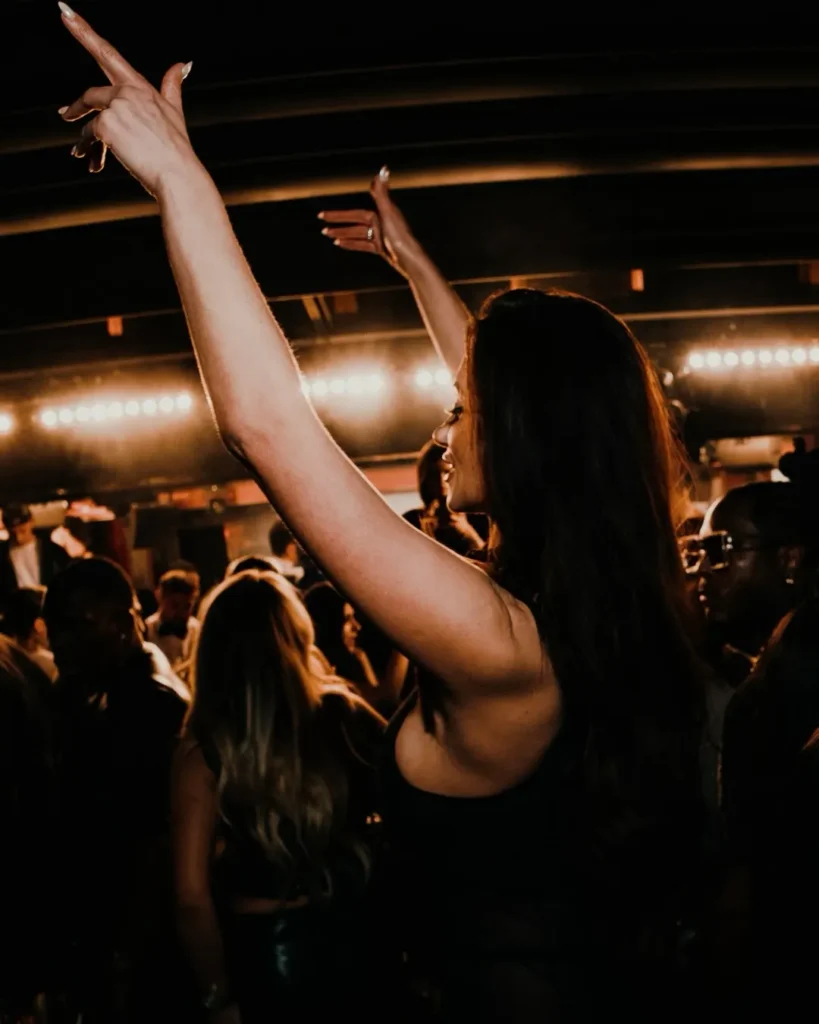 Guests enjoying the music and atmosphere at L'Arc Paris