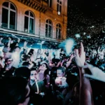 Crowd enjoying a lively night at L'Arc Paris