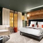 Stylish bedroom with alpine decor at Le Chabichou Courchevel