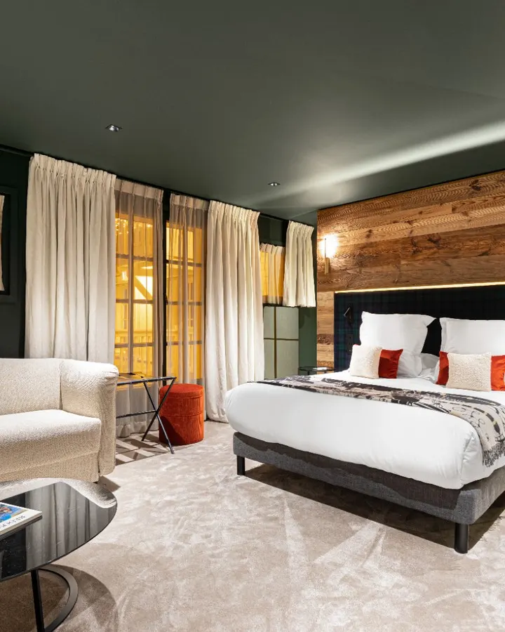 Stylish bedroom with alpine decor at Le Chabichou Courchevel