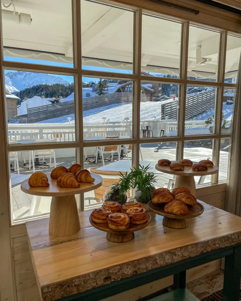 Dining area with large windows at Le Chabichou Courchevel