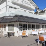 Snow-covered exterior and terrace of Le Chabichou Courchevel