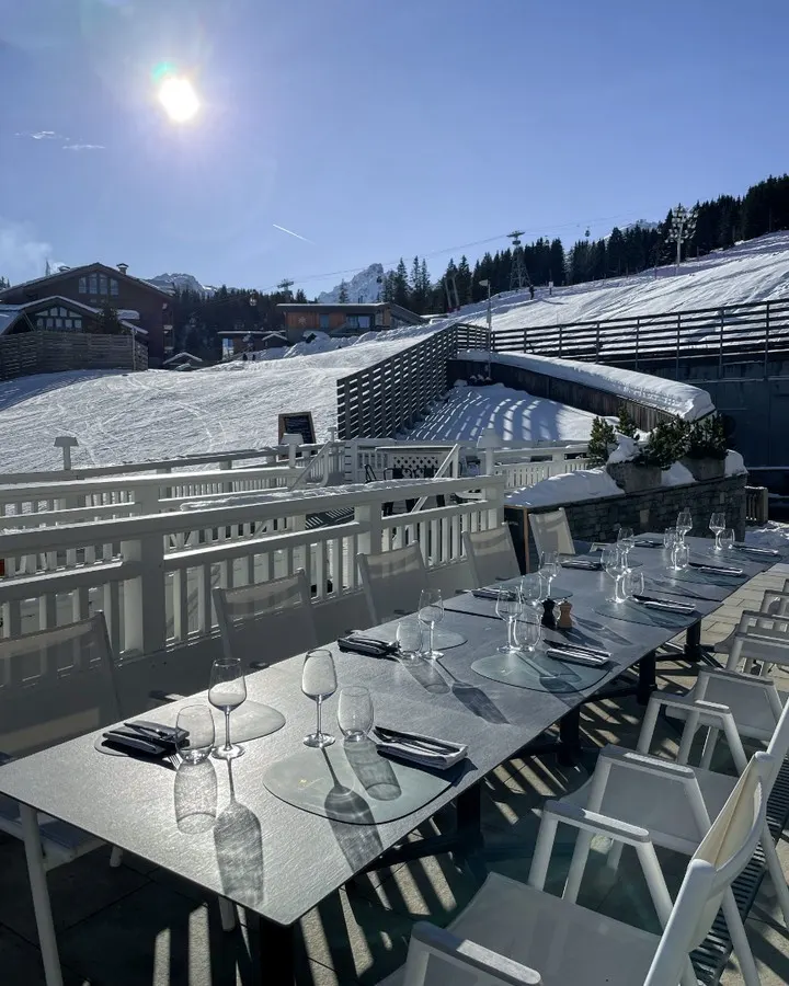 Le Chabichou Courchevel surrounded by snowy alpine scenery