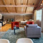 Warm wood-paneled lounge at Le Chabichou Courchevel