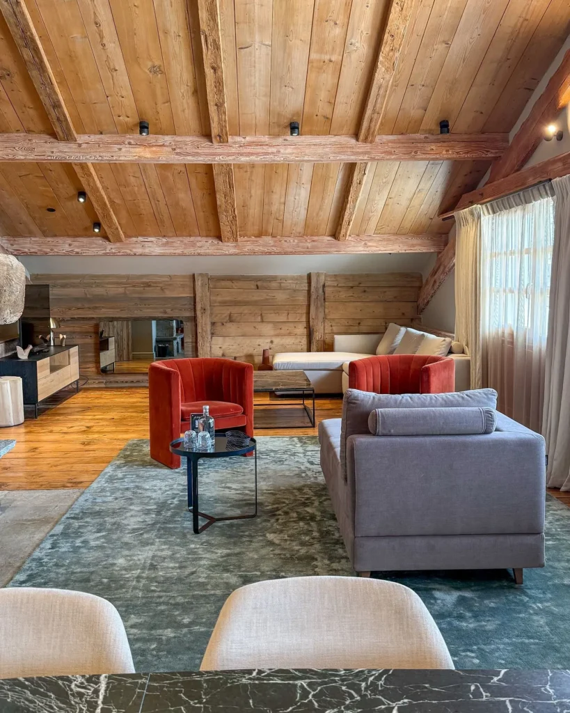 Warm wood-paneled lounge at Le Chabichou Courchevel