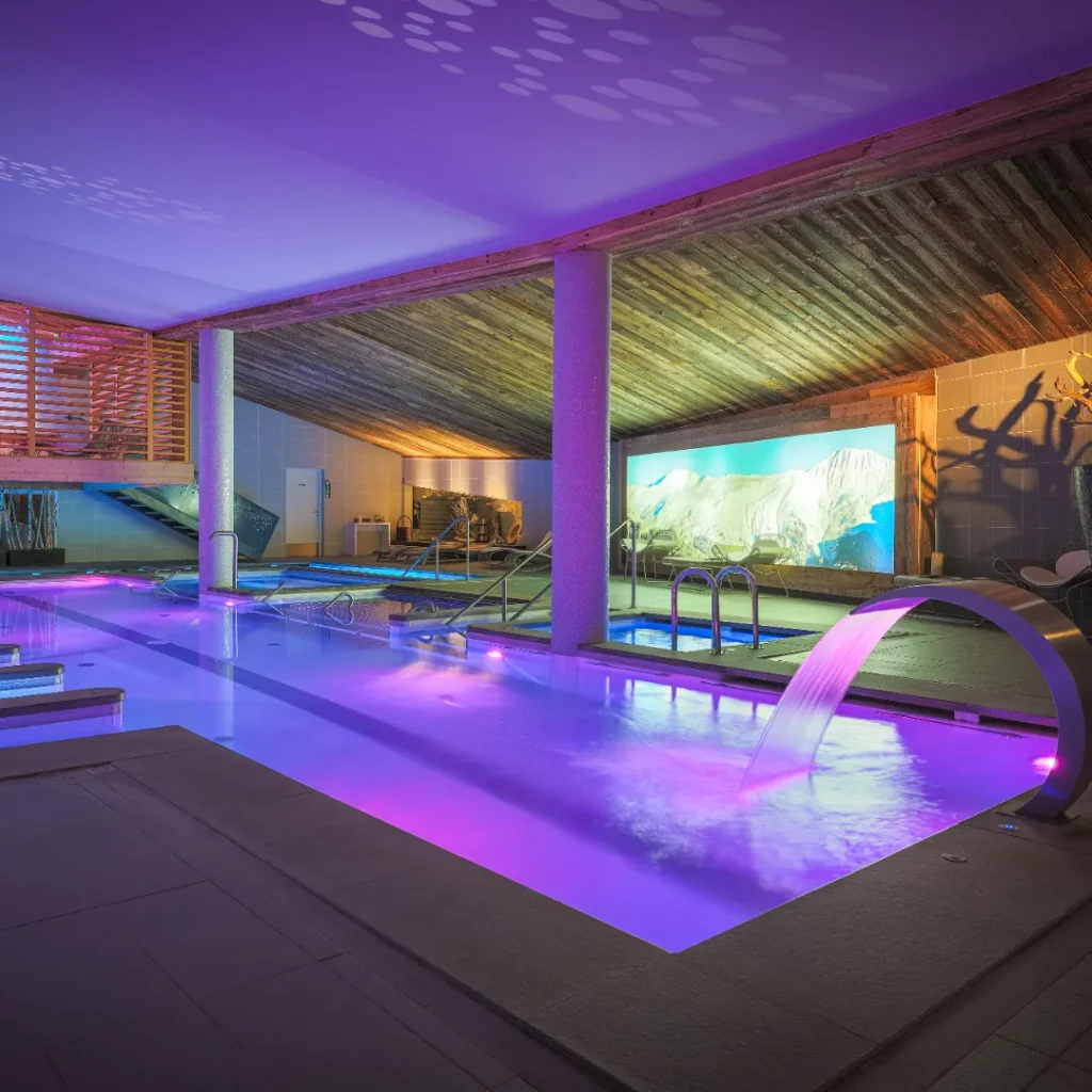 Illuminated indoor pool at Le Chabichou Courchevel