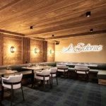 Wood-paneled restaurant interior at Le Chabichou Courchevel