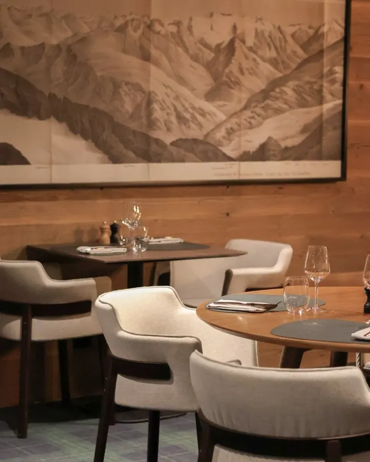 Le Chabichou restaurant dining area with alpine decor