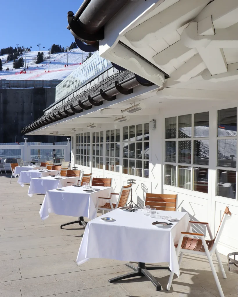 Outdoor terrace seating with mountain views at Le Chabichou Courchevel