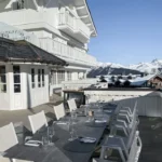 Outdoor terrace overlooking the snowy mountains at Le Chabichou Courchevel