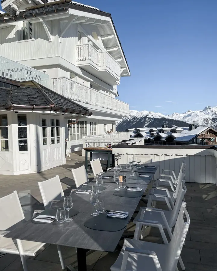 Outdoor terrace overlooking the snowy mountains at Le Chabichou Courchevel