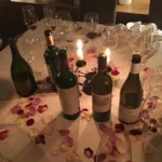 Champagne bottles and glasses arranged at Le Genepi Courchevel