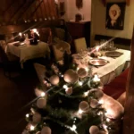 Elegant candlelit dining room at Le Genepi Courchevel
