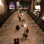 Long decorated dining room at Le Genepi Courchevel
