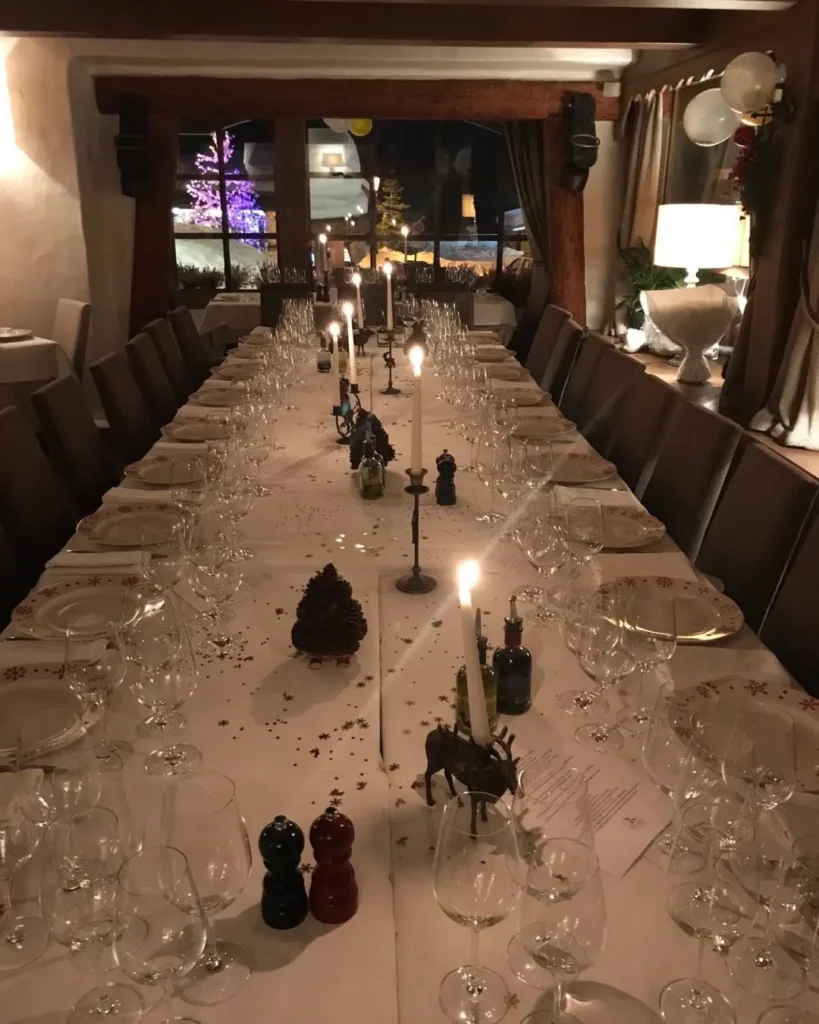 Long decorated dining room at Le Genepi Courchevel