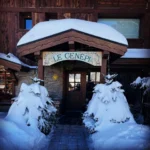Snow-covered entrance to Le Genepi Courchevel