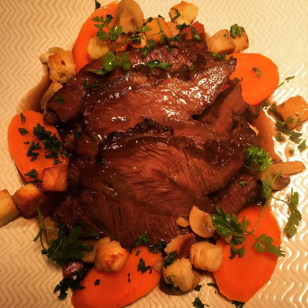 Gourmet meat dish served at Le Genepi Courchevel