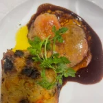 Artfully presented gourmet dish at Le Genepi Courchevel