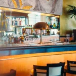 Stylish bar counter at Le Relais Plaza in Paris