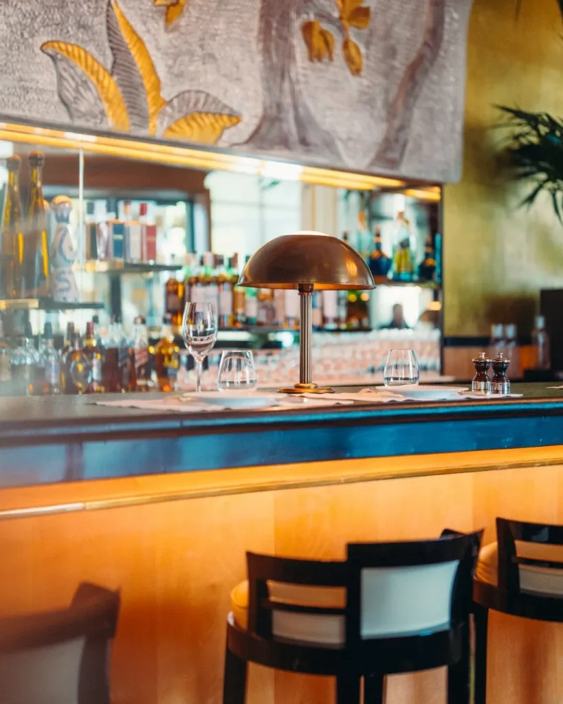 Stylish bar counter at Le Relais Plaza in Paris