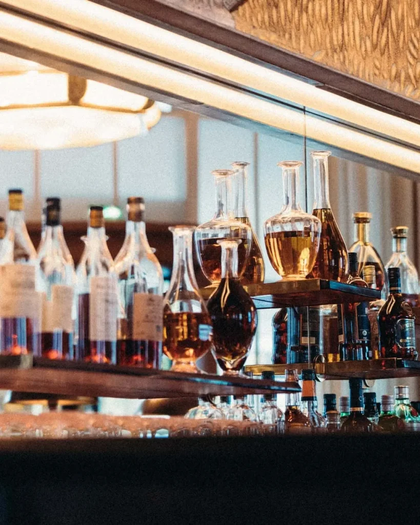 Elegant bar and drinks area at Le Relais Plaza in Paris
