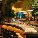 Elegant curved bar at Le Relais Plaza in Paris