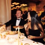 Guests enjoying dinner at Le Relais Plaza in Paris