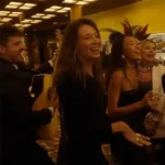 Guests enjoying an evening at Le Relais Plaza in Paris