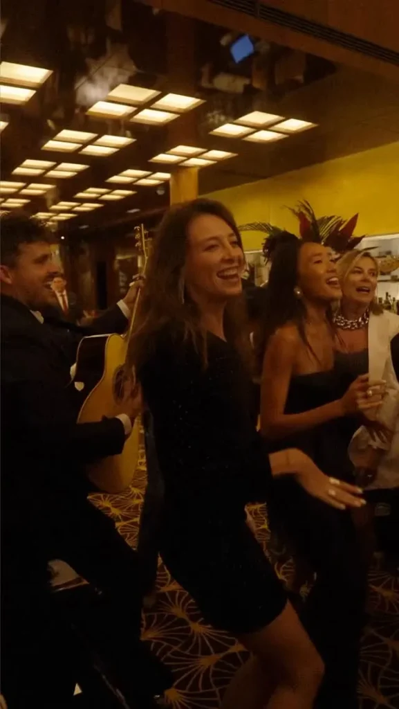 Guests enjoying an evening at Le Relais Plaza in Paris