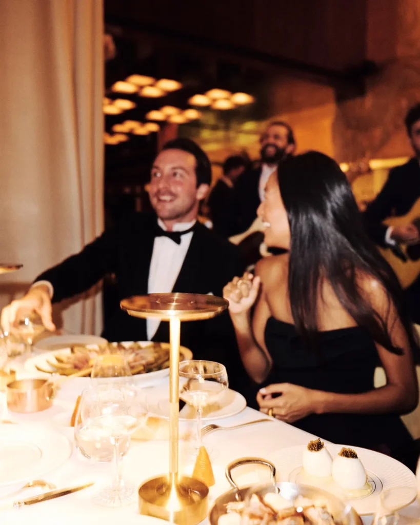 Guests enjoying dinner at Le Relais Plaza in Paris