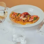 Colorful gourmet dish served at Le Relais Plaza in Paris