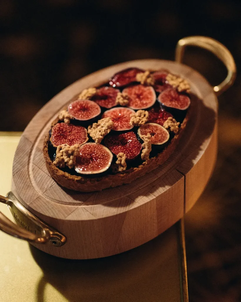 Gourmet dish served at Le Relais Plaza in Paris