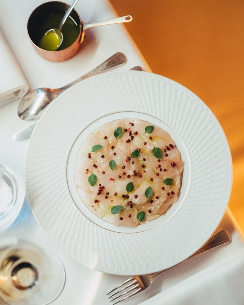 Gourmet soup dish served at Le Relais Plaza in Paris