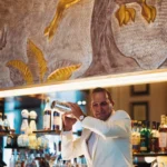 Chef working in the kitchen at Le Relais Plaza in Paris