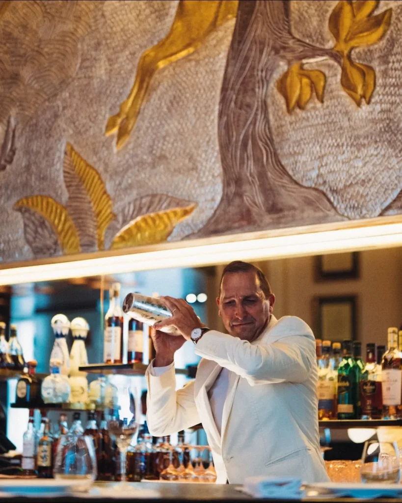 Chef working in the kitchen at Le Relais Plaza in Paris