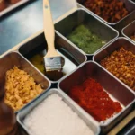 Selection of spices and ingredients at Le Relais Plaza in Paris