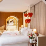 Elegant bedroom with romantic decor at Le Royal Monceau Paris