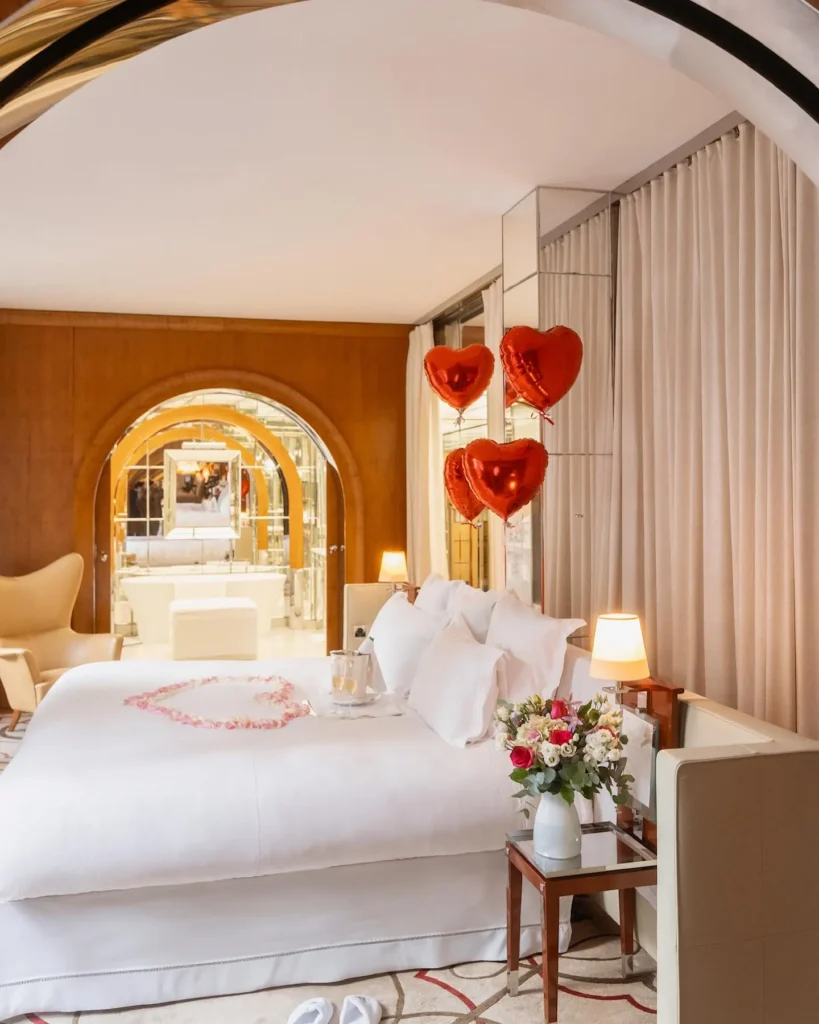 Elegant bedroom with romantic decor at Le Royal Monceau Paris