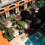 Aerial view of the courtyard and pool at Le Royal Monceau Paris