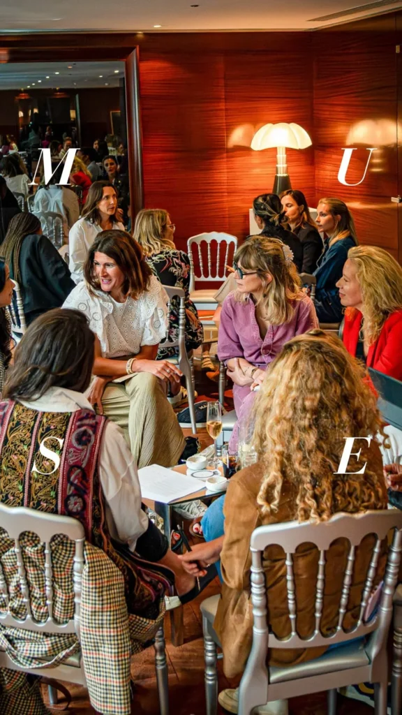 Guests enjoying an elegant dining experience at Le Royal Monceau Paris